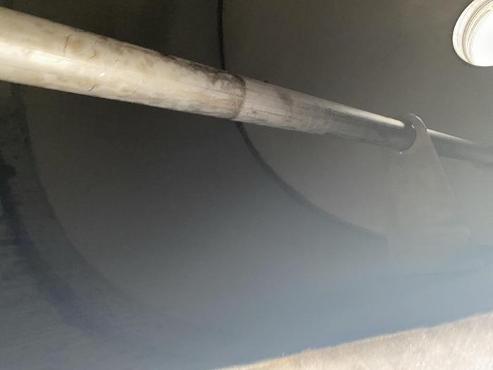 Used Used approximately 3000 gallon vertical stainless steel storage tank