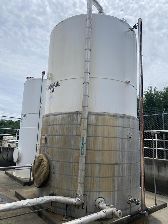 Used Used Highland Tank approximately 9500 gallon vertical carbon steel condensate tank.