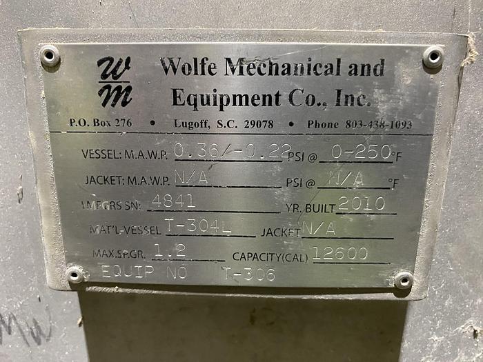 Used Used Wolfe Mechanical approximately 12,600 gallon 304L stainless steel vertical tank. 12' diameter X 15' high straight side