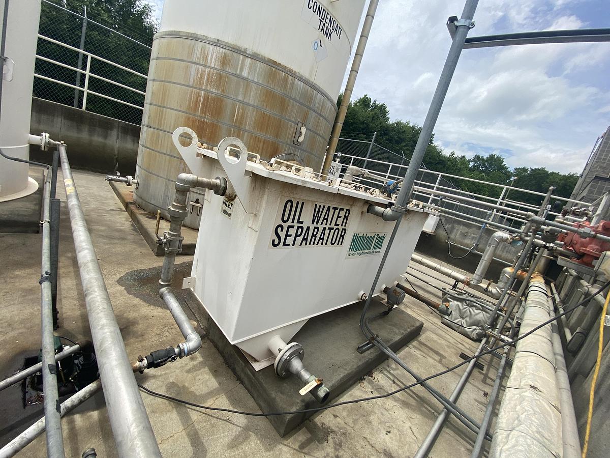 Used Used Highland Tank approximately 300 gallon rectangular carbon steel oil/water separator tank