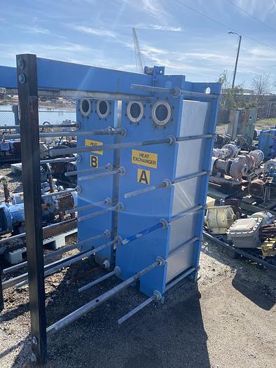 Used Used Tranter Supercharger approximately 563.60 sq ft stainless steel plate heat exchanger