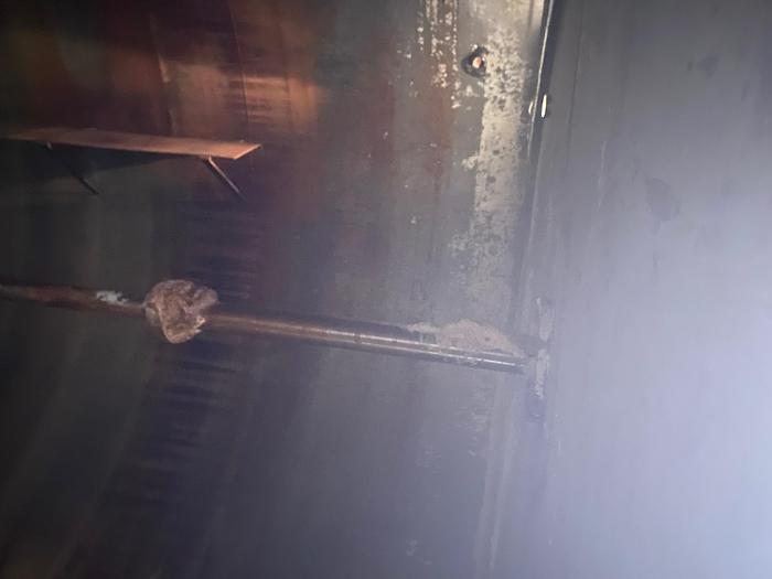 Used Used Wolfe Mechanical approximately 12,600 gallon 304L stainless steel vertical mix tank