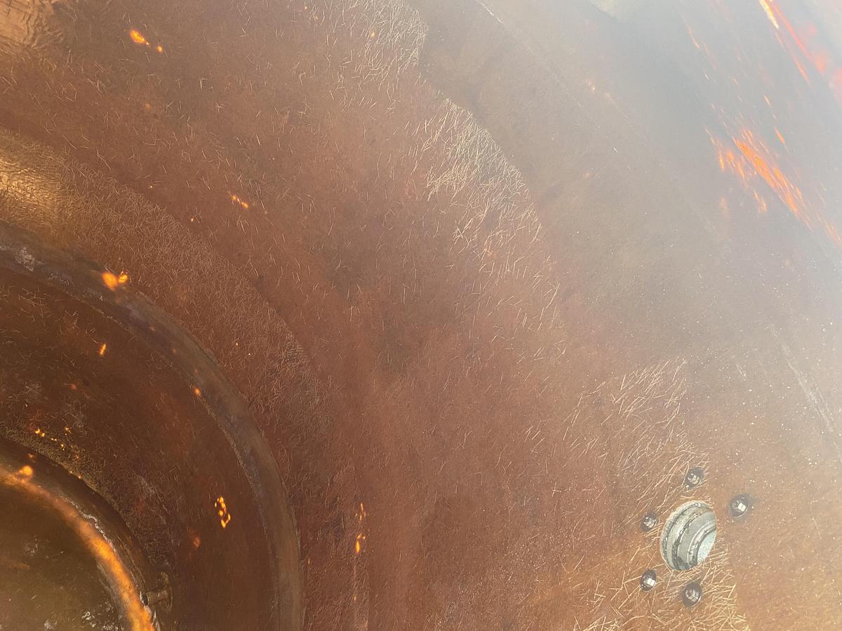 Used Used approximately 4,000 gallon vertical fiberglass storage tank.