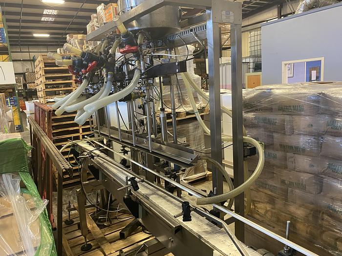 Used Used E-Pak 6 Head automatic pressure gravity filler