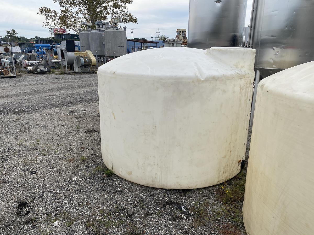 Used Used Norwesco 1550 gallon Polyethylene vertical storage tank.