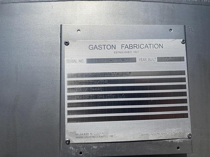 Used Used Gaston County approximately 2800 gallon 304L stainless steel vertical tank
