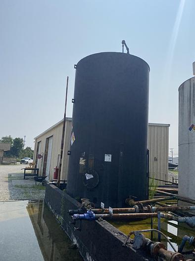 Used Used approximately 10,000 gallon carbon steel vertical storage tank.