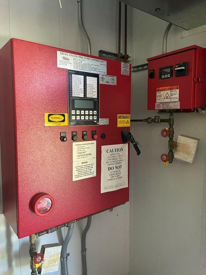 Unused Complete Diesel Fire Pump System in skidded Building