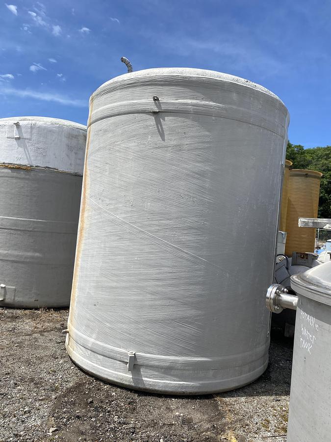 Used Used approximately 4,000 gallon vertical fiberglass storage tank.