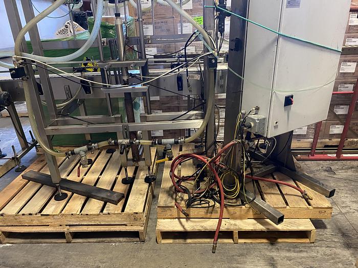 Used Used E-Pak 6 Head automatic pressure gravity filler