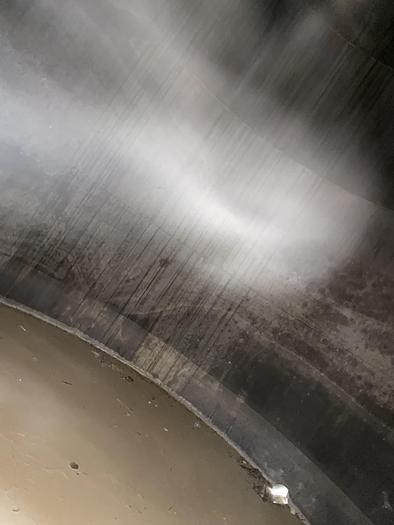 Used Used approximately 16,000 gallon 304 stainless steel vertical tank