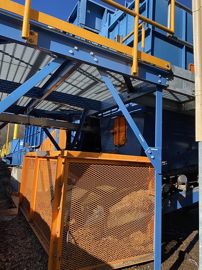 Used Used Bruks 70' Back-On Truck Dump with optimized smooth cargo flow receiving hopper