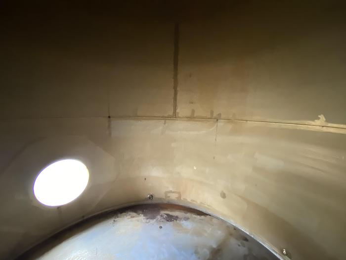 Used Used Wolfe Mechanical approximately 10,000 gallon 304L stainless steel vertical tank