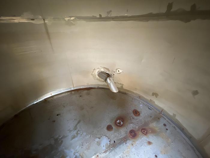 Used Used Wolfe Mechanical approximately 10,000 gallon 304L stainless steel vertical tank