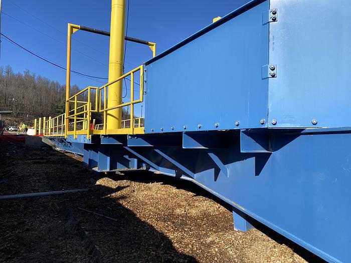 Used Used Bruks 70' Back-On Truck Dump with optimized smooth cargo flow receiving hopper