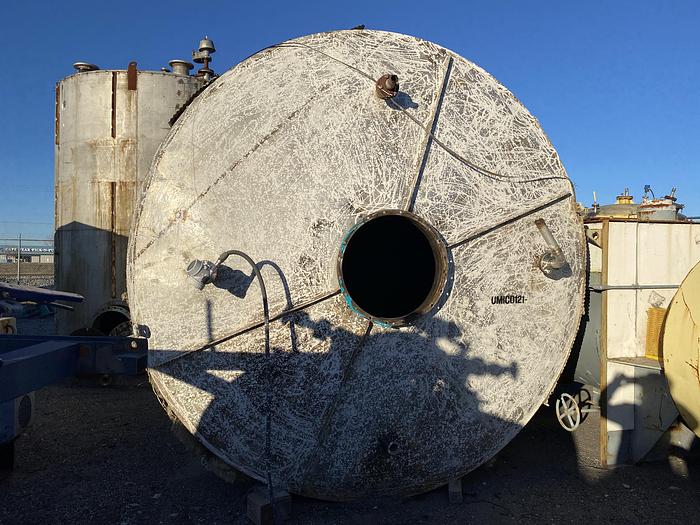 Used Used approximately 8500 gallon vertical stainless steel tank