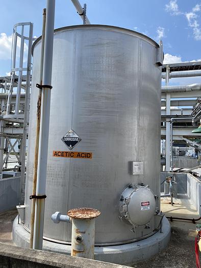 Used Used Bendel 7000 gallon 316 SS vertical storage tank.  10' diameter X 12' high straight side