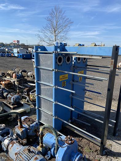 Used Used Tranter Supercharger approximately 563.60 sq ft stainless steel plate heat exchanger