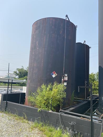 Used Used approximately 11,500 gallon carbon steel vertical storage tank