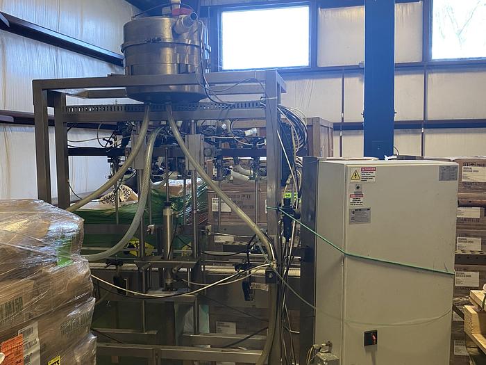 Used Used E-Pak 6 Head automatic pressure gravity filler