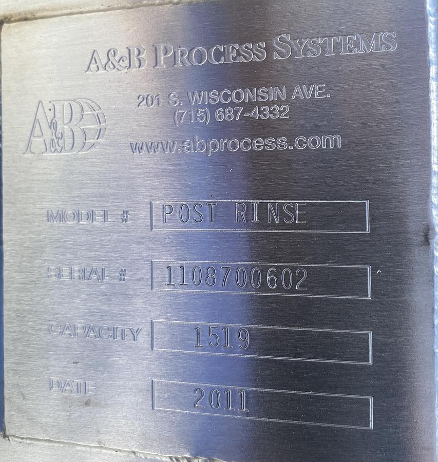 Used Used A & B Process approximately 1,000 gallon sanitary stainless steel vertical tank