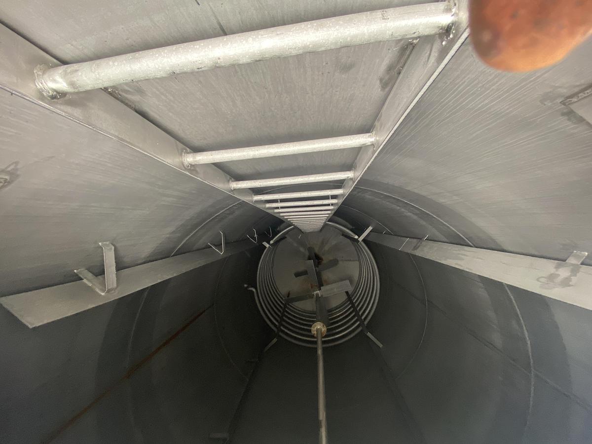 Used Used Industrial Air Inc. approximately 10,000 gallon stainless steel agitated storage tank with internal coils