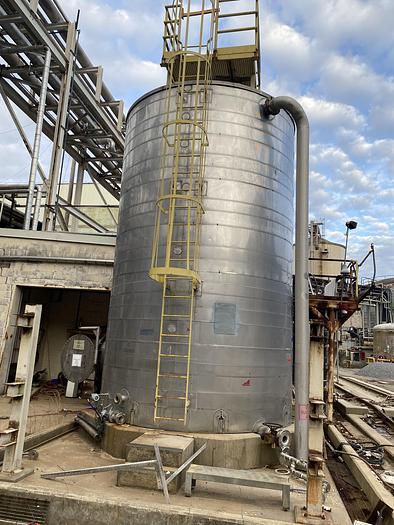 Used Used approximately 16,000 gallon 304 stainless steel vertical tank
