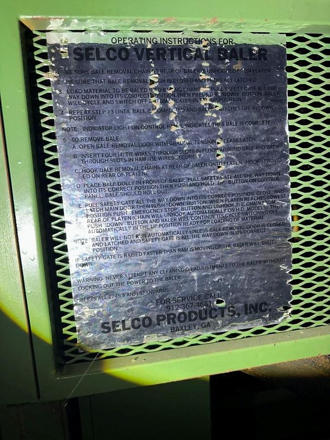 Used Used Selco Products Inc. by Harris Equipment Model V5HD-LH baler.