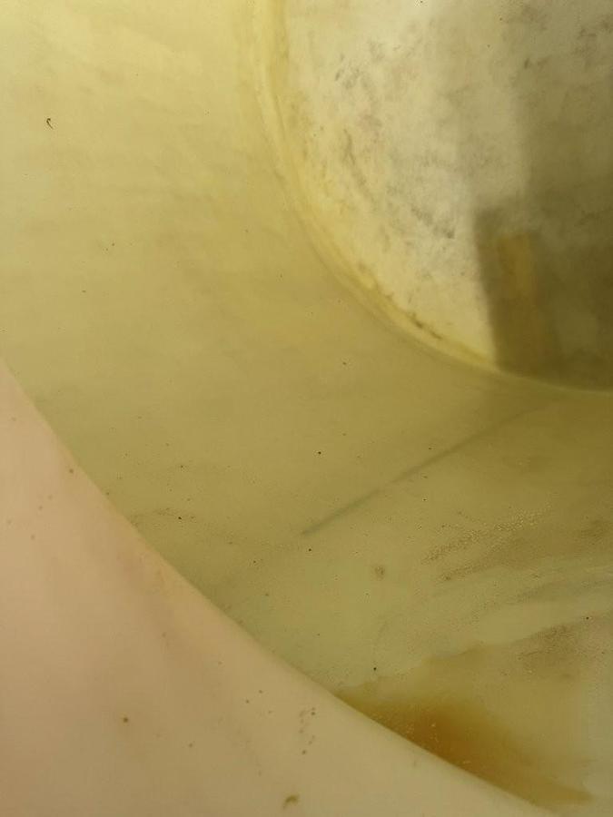 Used Used Norwesco 1550 gallon Polyethylene vertical storage tank