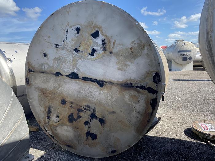 Used Used approximately 3000 gallon vertical stainless steel storage tank