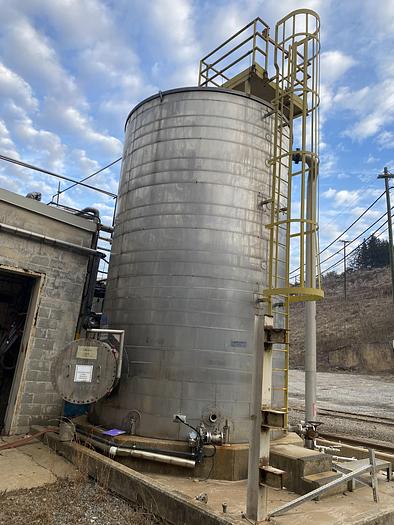 Used Used approximately 16,000 gallon 304 stainless steel vertical tank