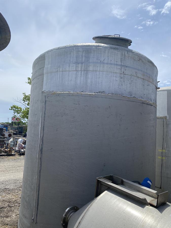 Used Used approximately 4,000 gallon vertical fiberglass storage tank.
