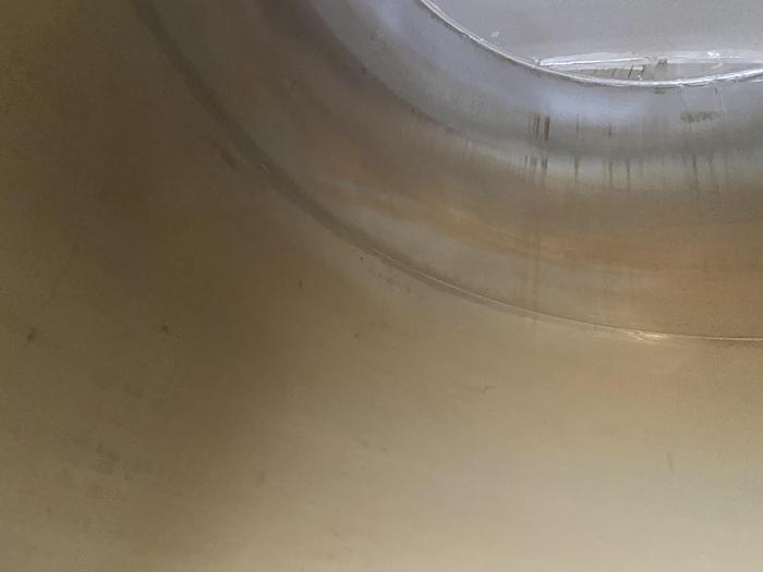 Used Used Wolfe Mechanical approximately 10,000 gallon 304L stainless steel vertical tank