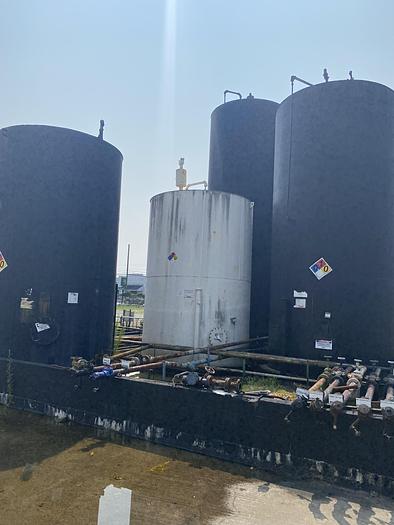 Used Used approximately 10,000 gallon carbon steel vertical storage tank