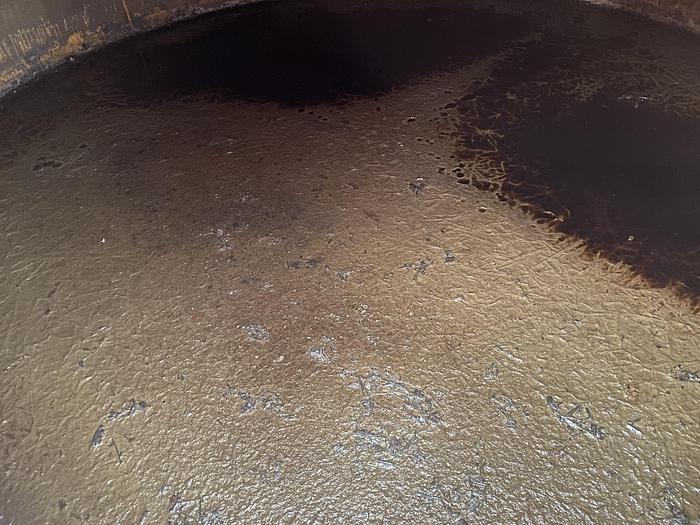 Used Used Lundberg approximately 18,000 gallon carbon steel vertical tank