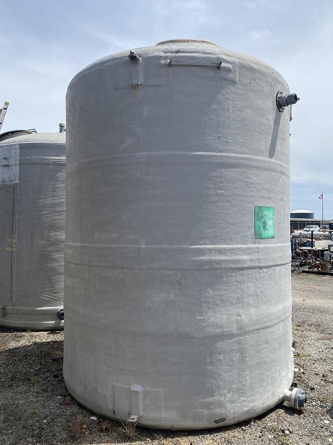 Used Used approximately 4,000 gallon vertical fiberglass storage tank.