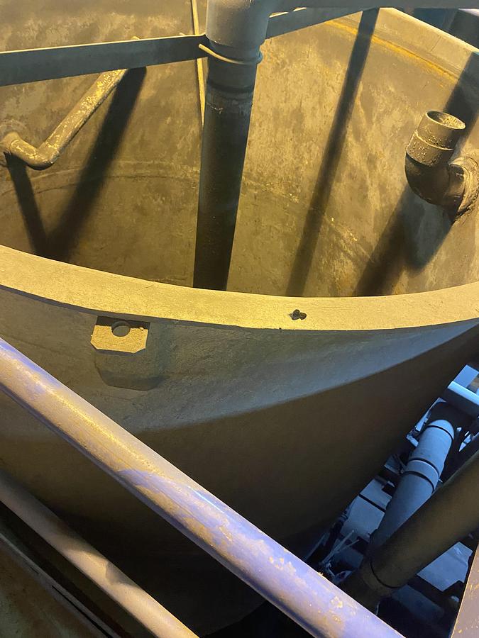 Used (2) Used approximately 3000 gallon fiberglass cone bottom tanks