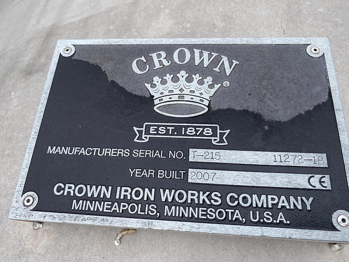 Unused Crown Iron Works Inc. approximately 1300 gallon 304 stainless steel vertical tank