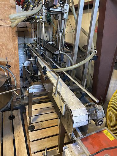 Used Used E-Pak 6 Head automatic pressure gravity filler