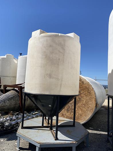 Used Used Assmann approximately 1100 gallon cone bottom poly tank.