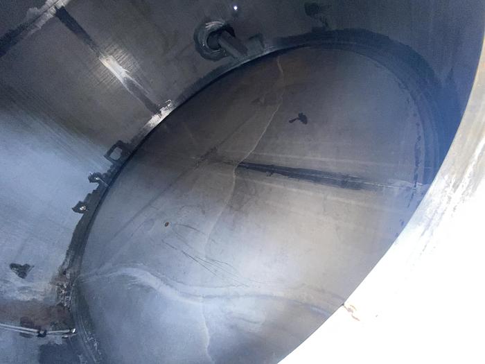 Used Used Wolfe Mechanical approximately 10,000 gallon 304L stainless steel vertical tank