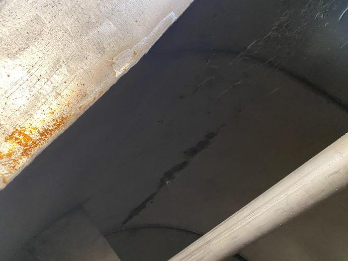 Used Used approximately 3000 gallon vertical stainless steel storage tank