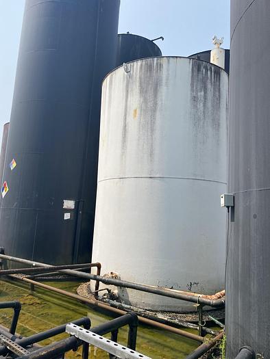 Used Used approximately 10,000 gallon carbon steel vertical storage tank