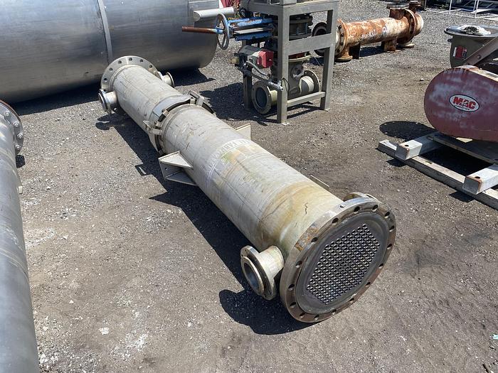 Used Used Titan Metal Fabricators Inc.  approximately 340 sq ft. 316L/Tantalum vertical shell and tube heat exchanger