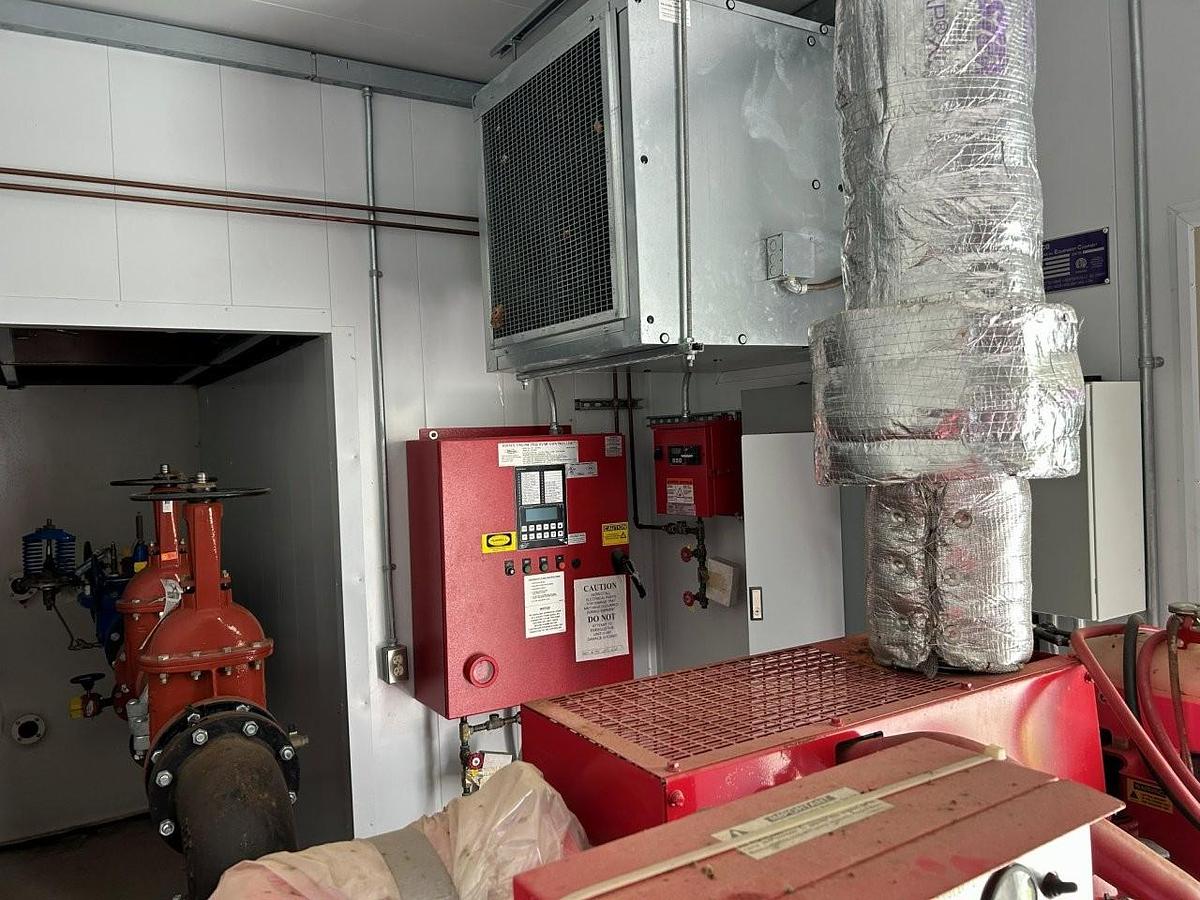 Unused Complete Diesel Fire Pump System in skidded Building