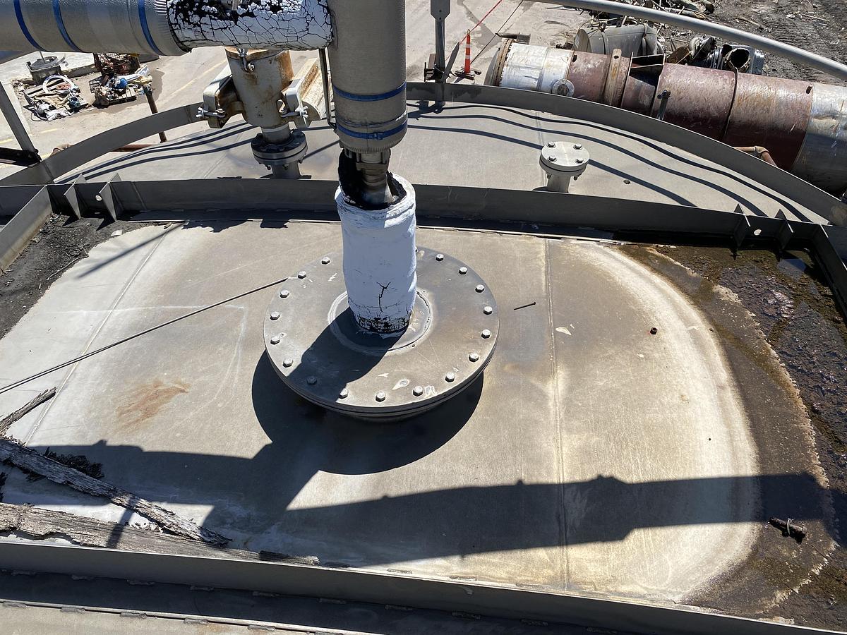 Used Used Knight Fabrication approximately 14,000 gallon stainless steel vertical tank