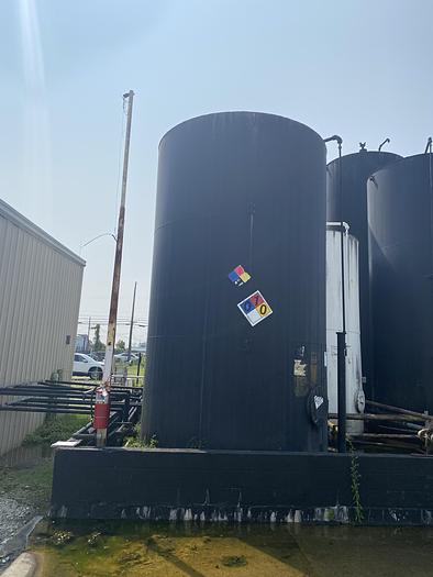 Used Used approximately 10,000 gallon carbon steel vertical storage tank.