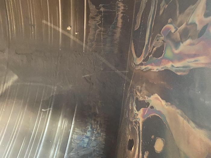 Used Used approximately 8500 gallon vertical stainless steel tank