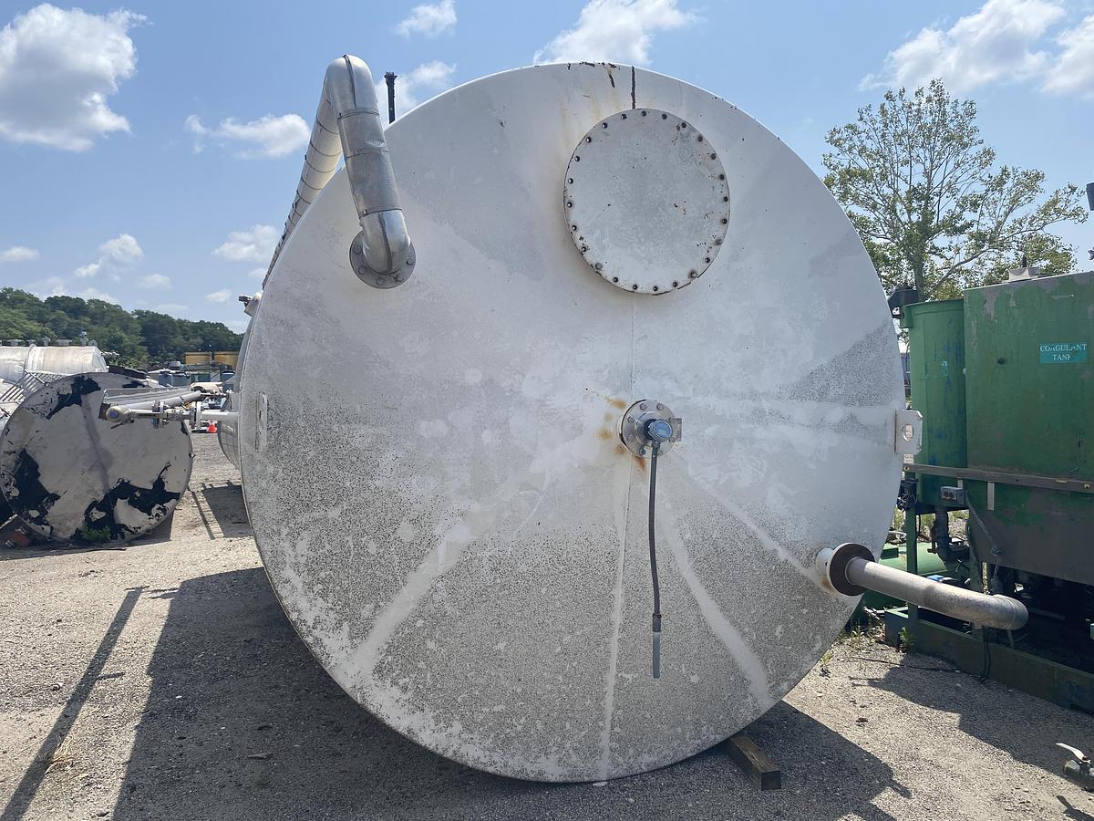 Used Used Highland Tank approximately 9500 gallon vertical carbon steel condensate tank.