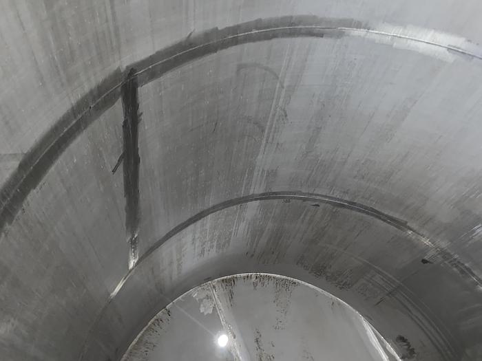 Used Used Wolfe Mechanical approximately 10,000 gallon 304L stainless steel vertical tank